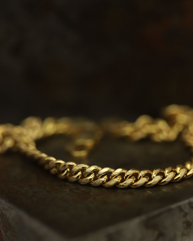 X Gold Curb Link Chain Bracelet