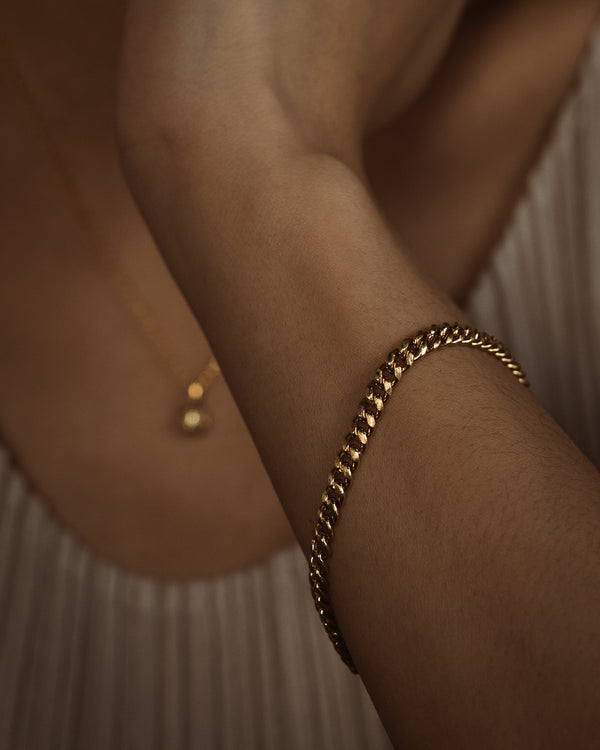 X Gold Curb Link Chain Bracelet