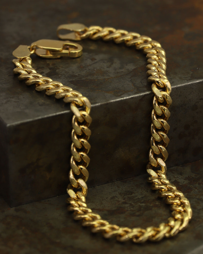 X Gold Curb Link Chain Bracelet